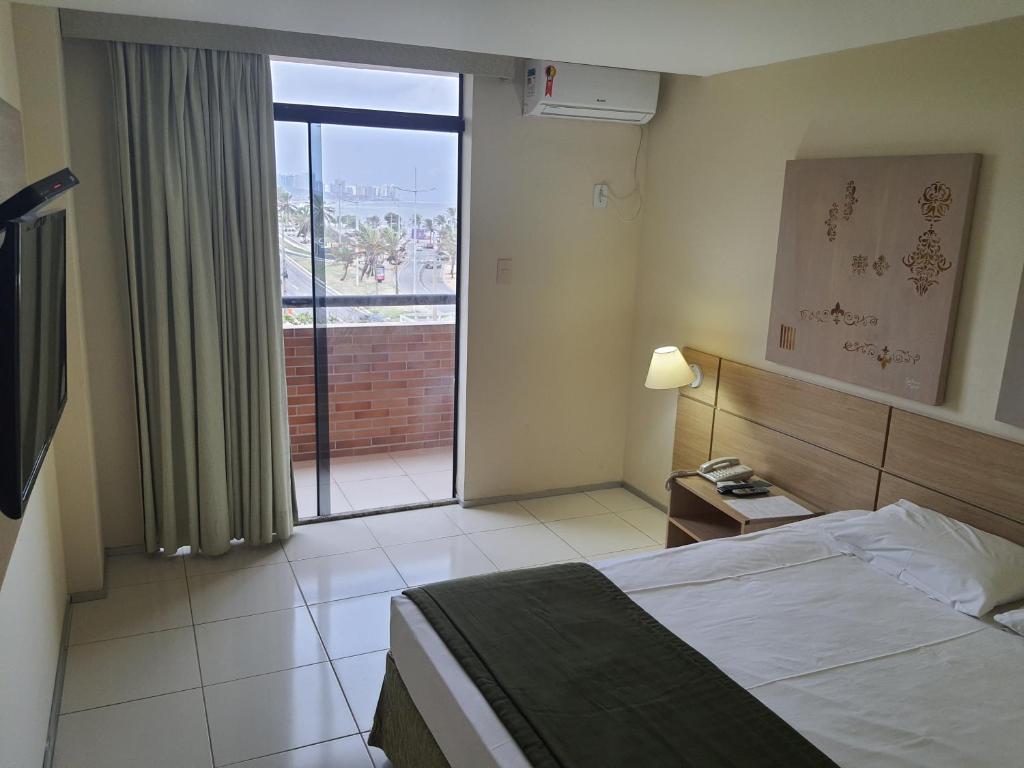 Praiabella Hotel São Luís Buitenkant foto